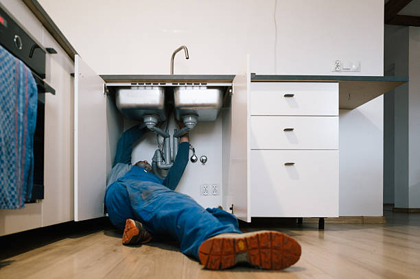 Professional Drain Cleaning technician working in Grimes, IA